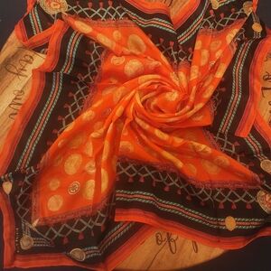 Vibrant Orange and Black Patterned Scarf